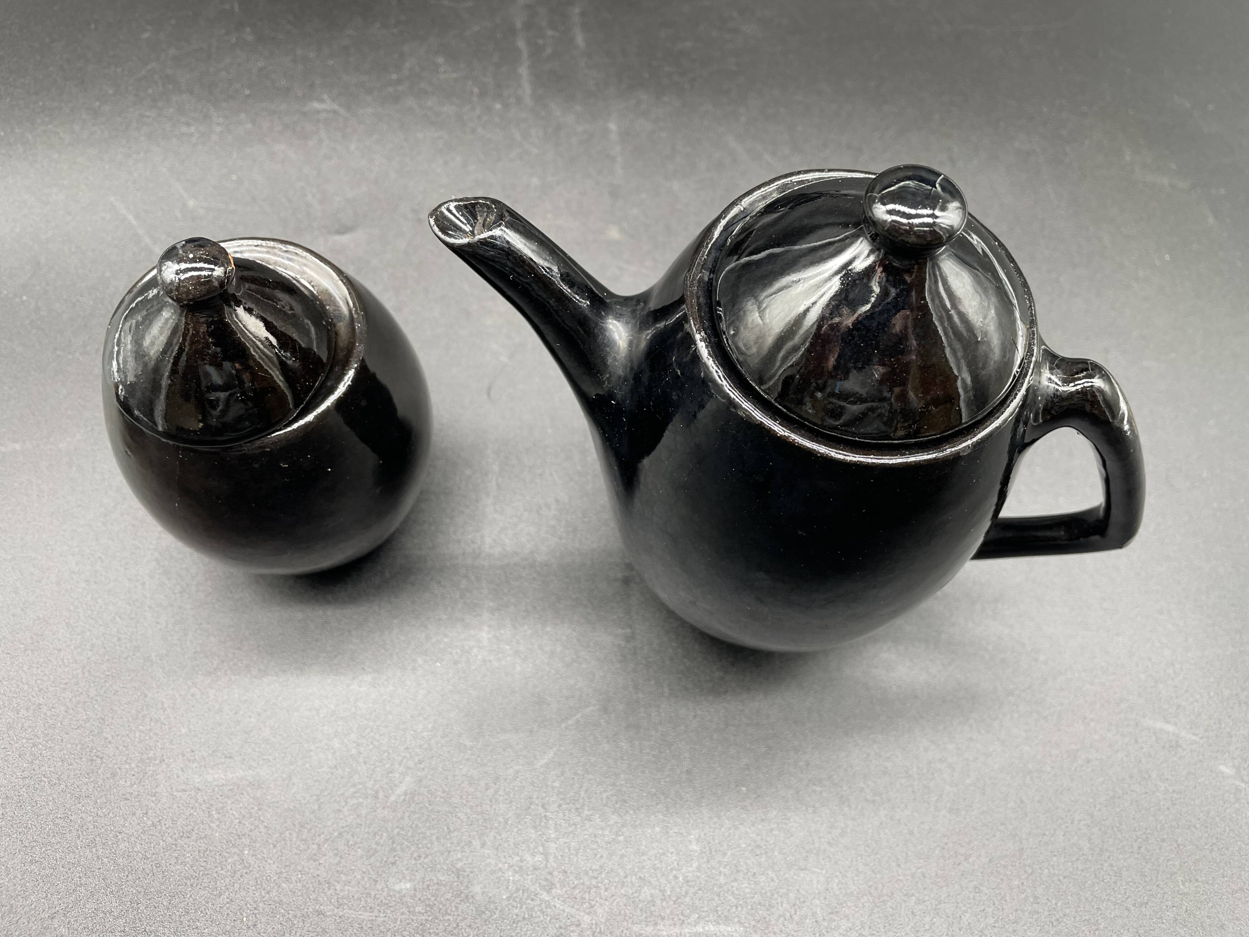 Brutalist black ceramic coffee service – Modernist design