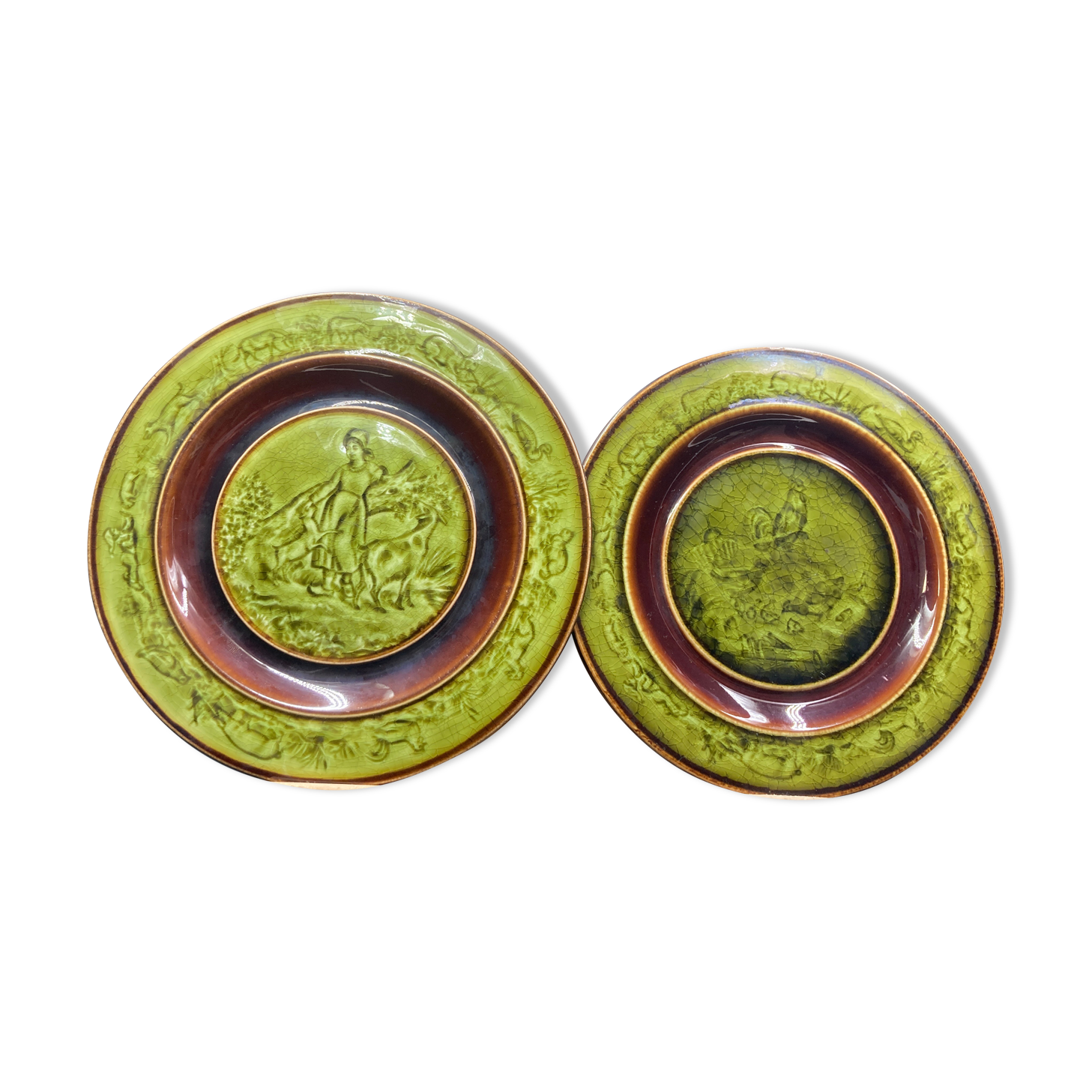 Two faience plates enamelled with choisy le roi HB & cie