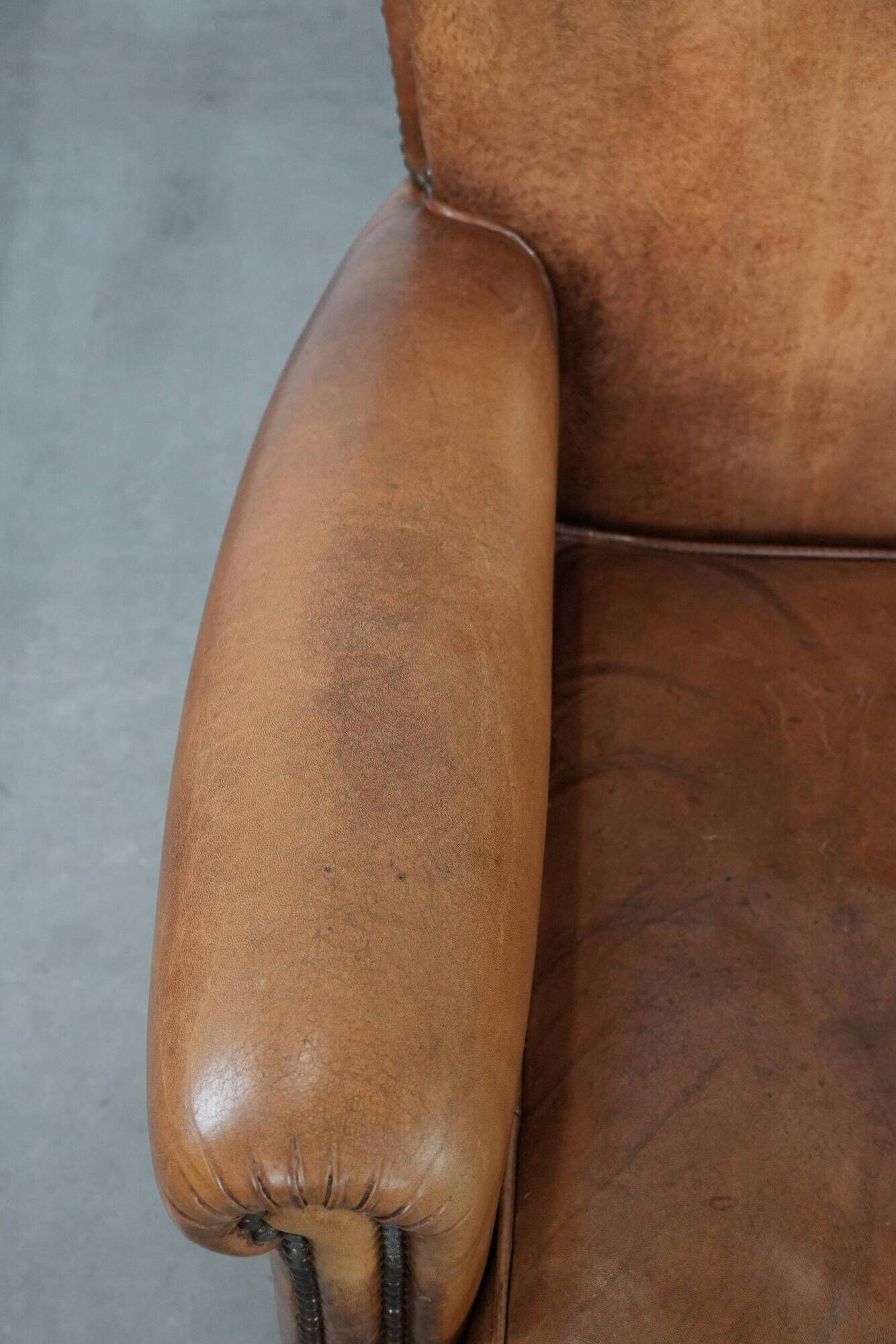 Set of two vintage sheepskin armchairs with beautiful and warm colours