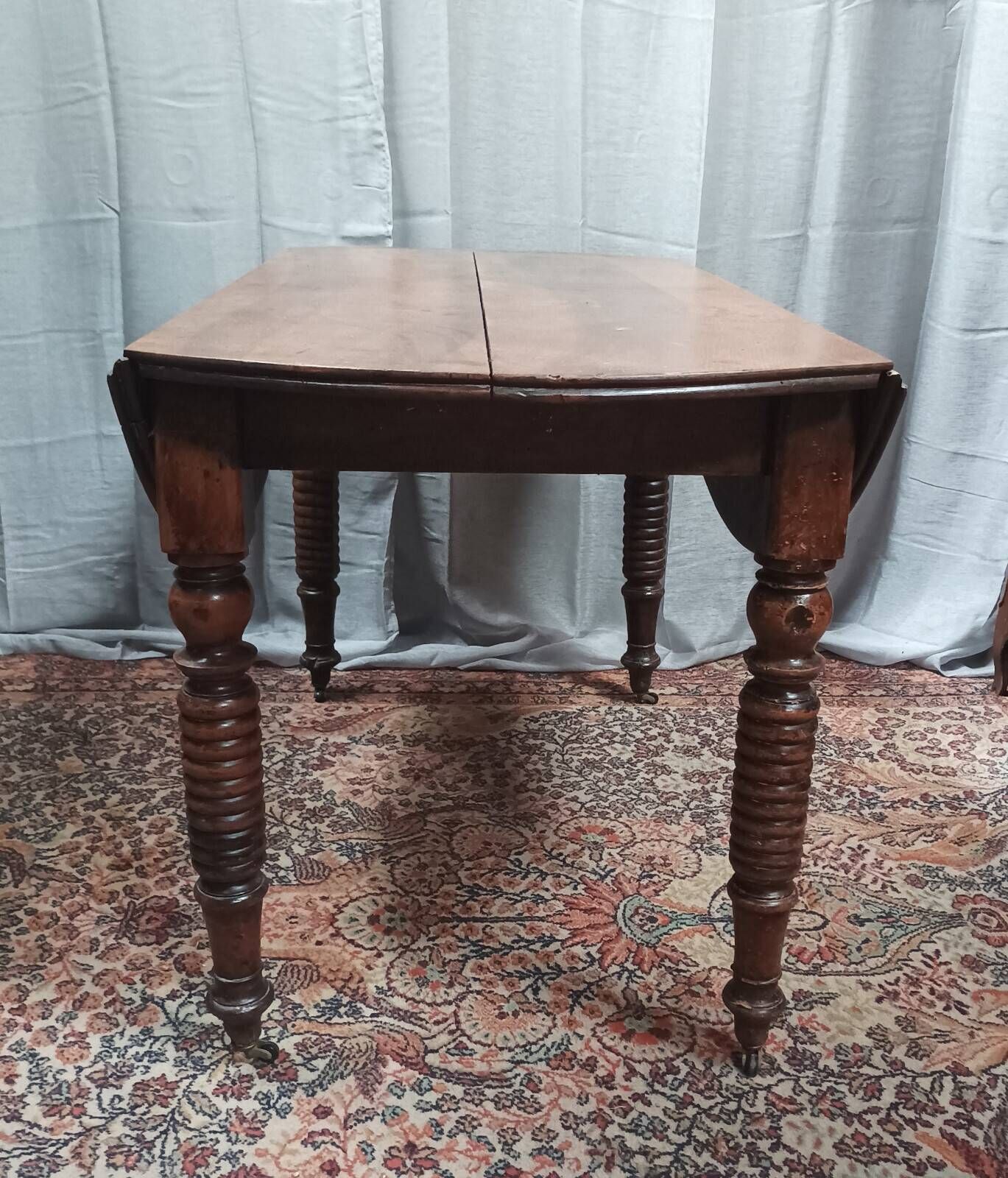 19th-century Louis Philippe walnut drop-leaf table.