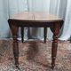 19th-century Louis Philippe walnut drop-leaf table.