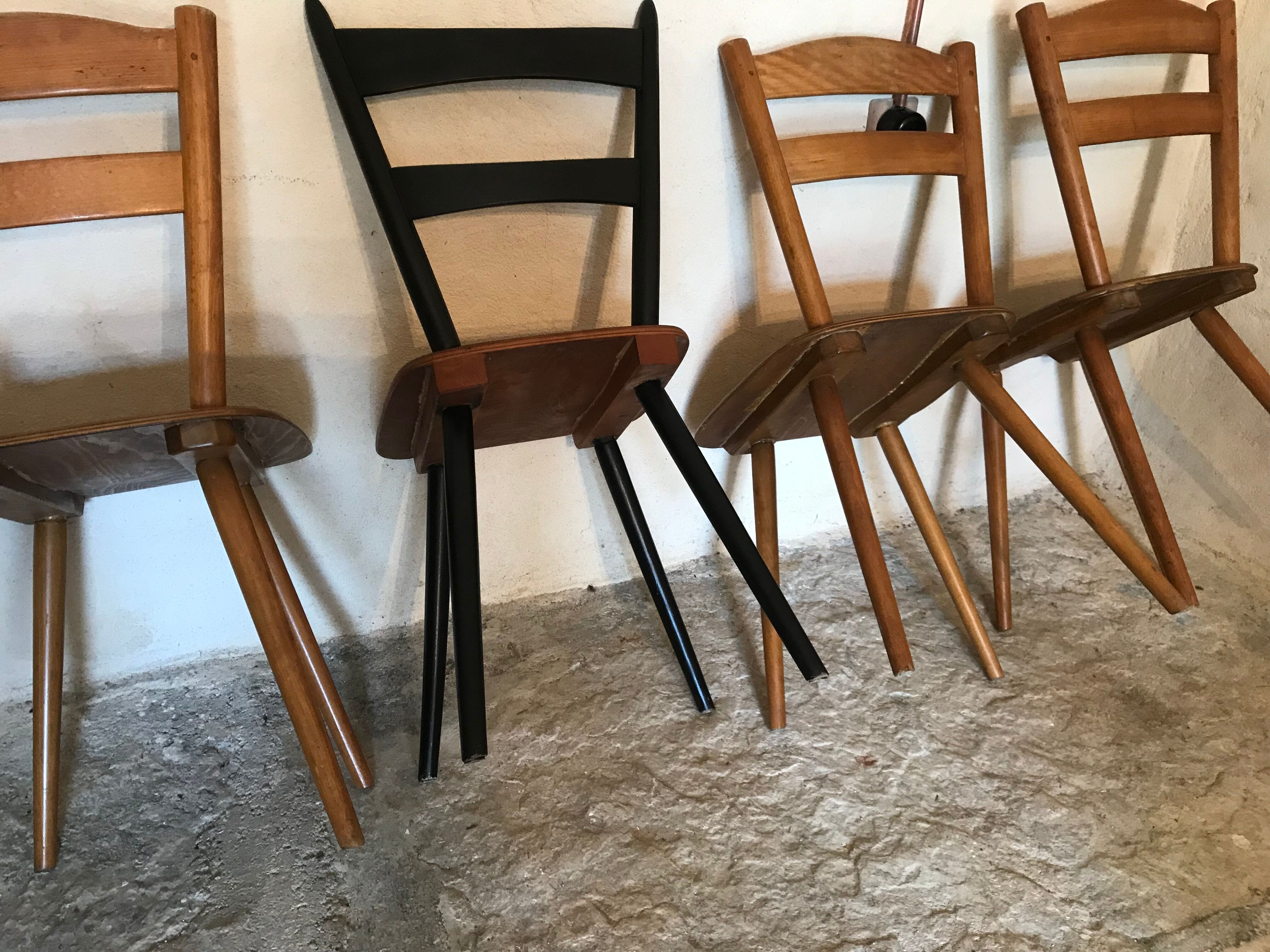 Set of 4 mismatched vintage chairs compass legs