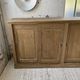 Large row of solid oak loom sliding doors