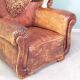 Leather nailed armchair