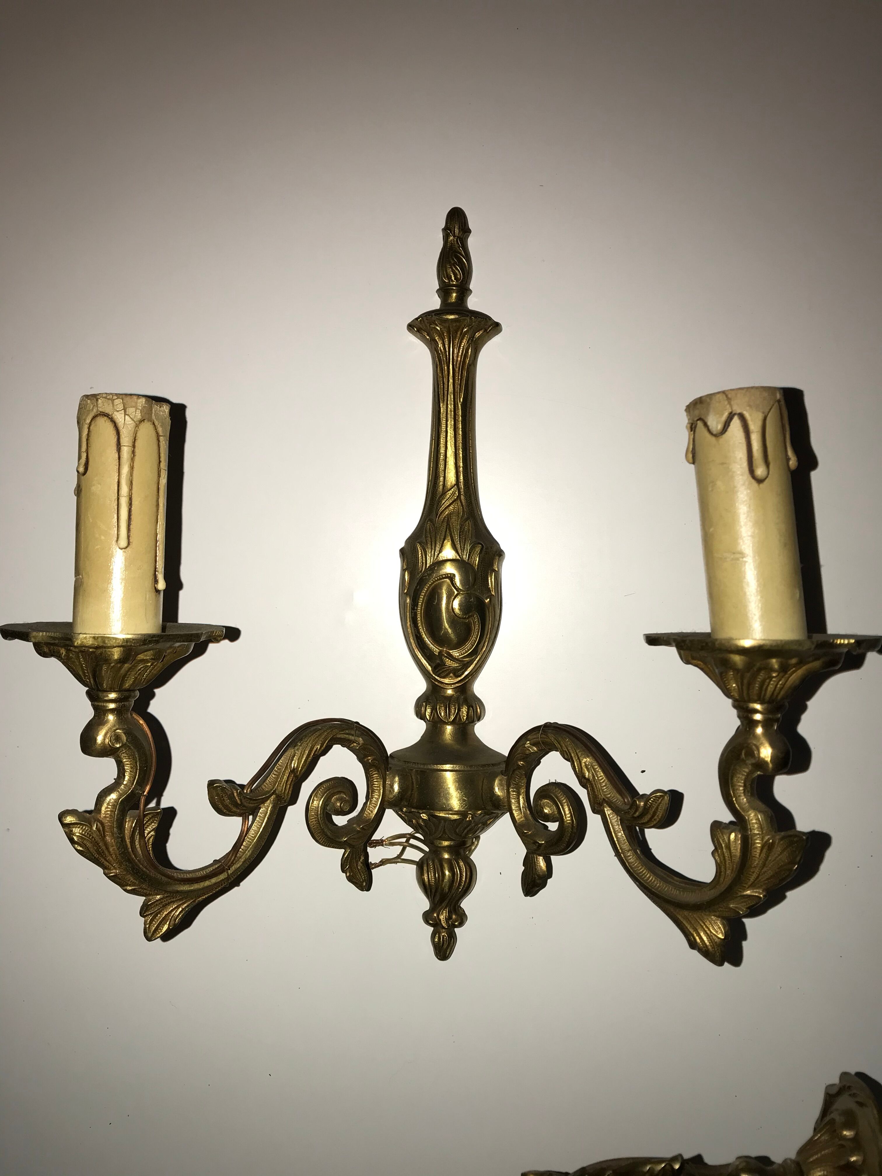 Pair of Louis XV style bronze wall sconces