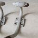 Two vintage coat hooks