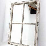 Vintage wooden window converted to a mirror
