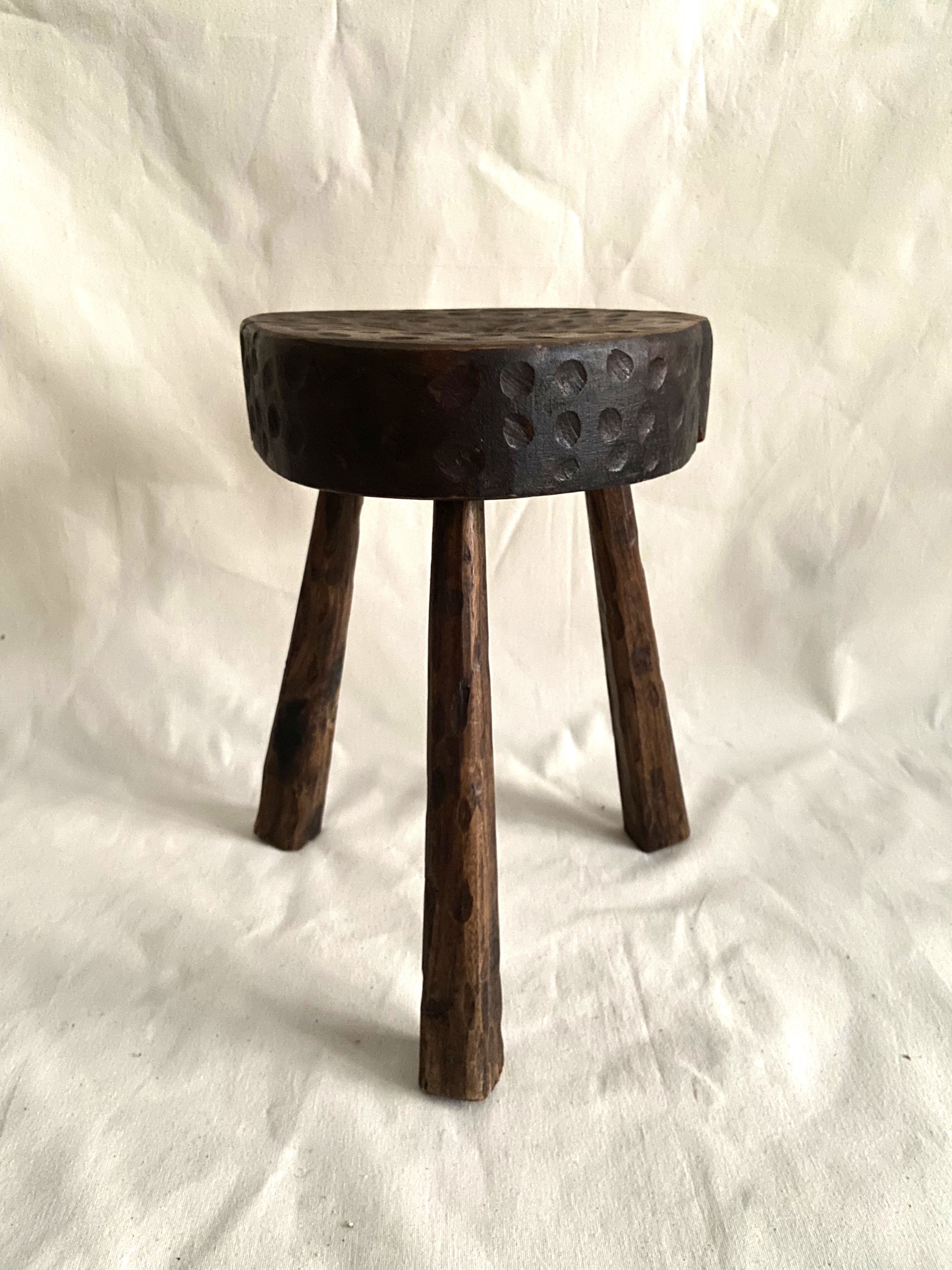 Brutalist tipode stool in carved wood