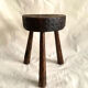 Brutalist tipode stool in carved wood