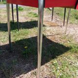 Dining table with red formica extensions