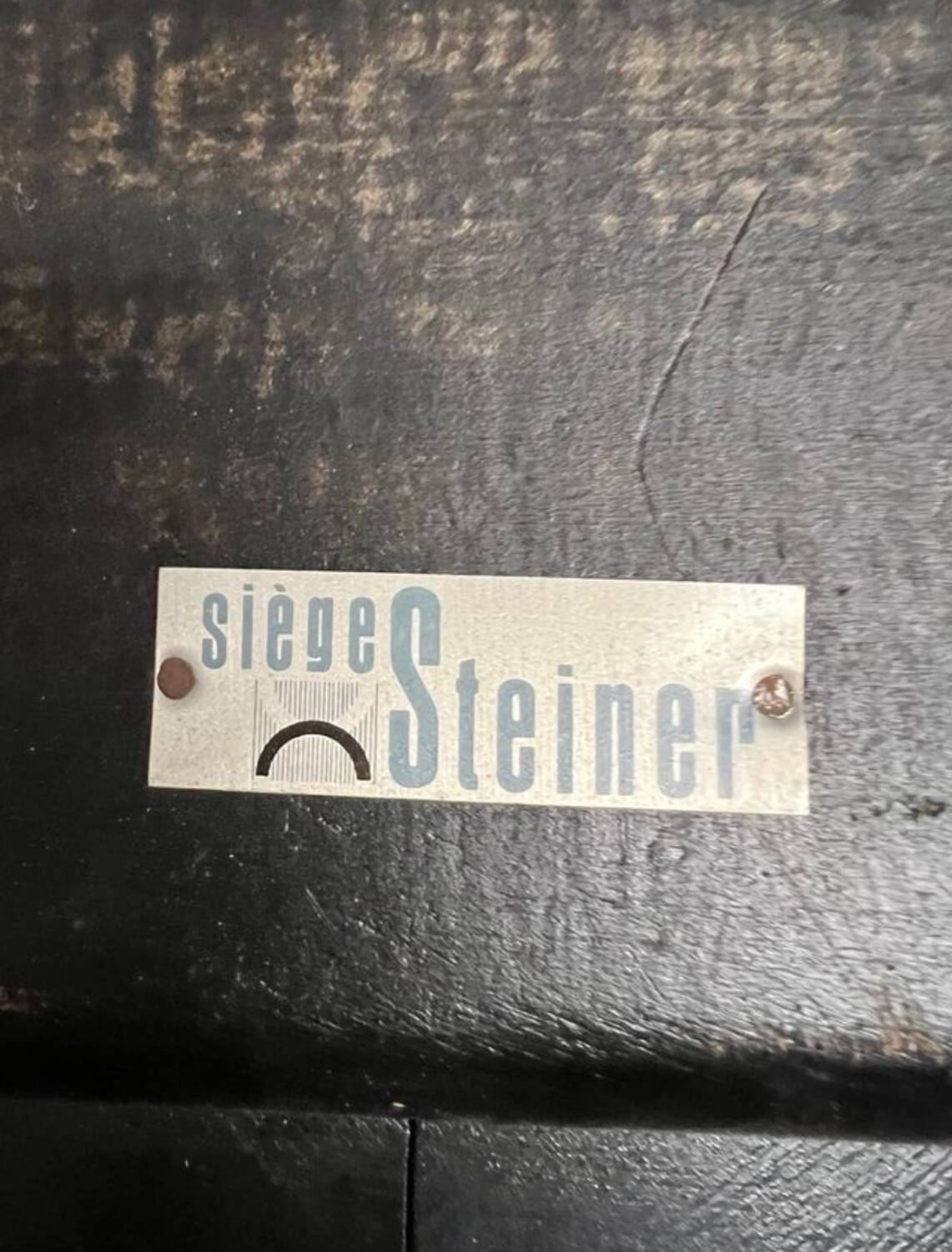 Tonneau chairs designed by Pierre Guairche for Steiner