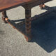 Solid oak extendable table, turned legs – 19th century