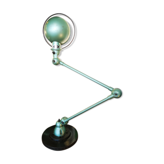 Old green metallic Jieldé lamp
