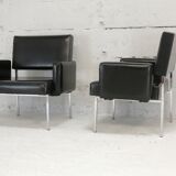 Pair of stainless steel, black leather-like armchairs, France, circa 1970