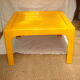 Table basse résine orange circa 1970