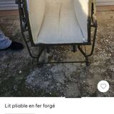 Folding wrought iron bed