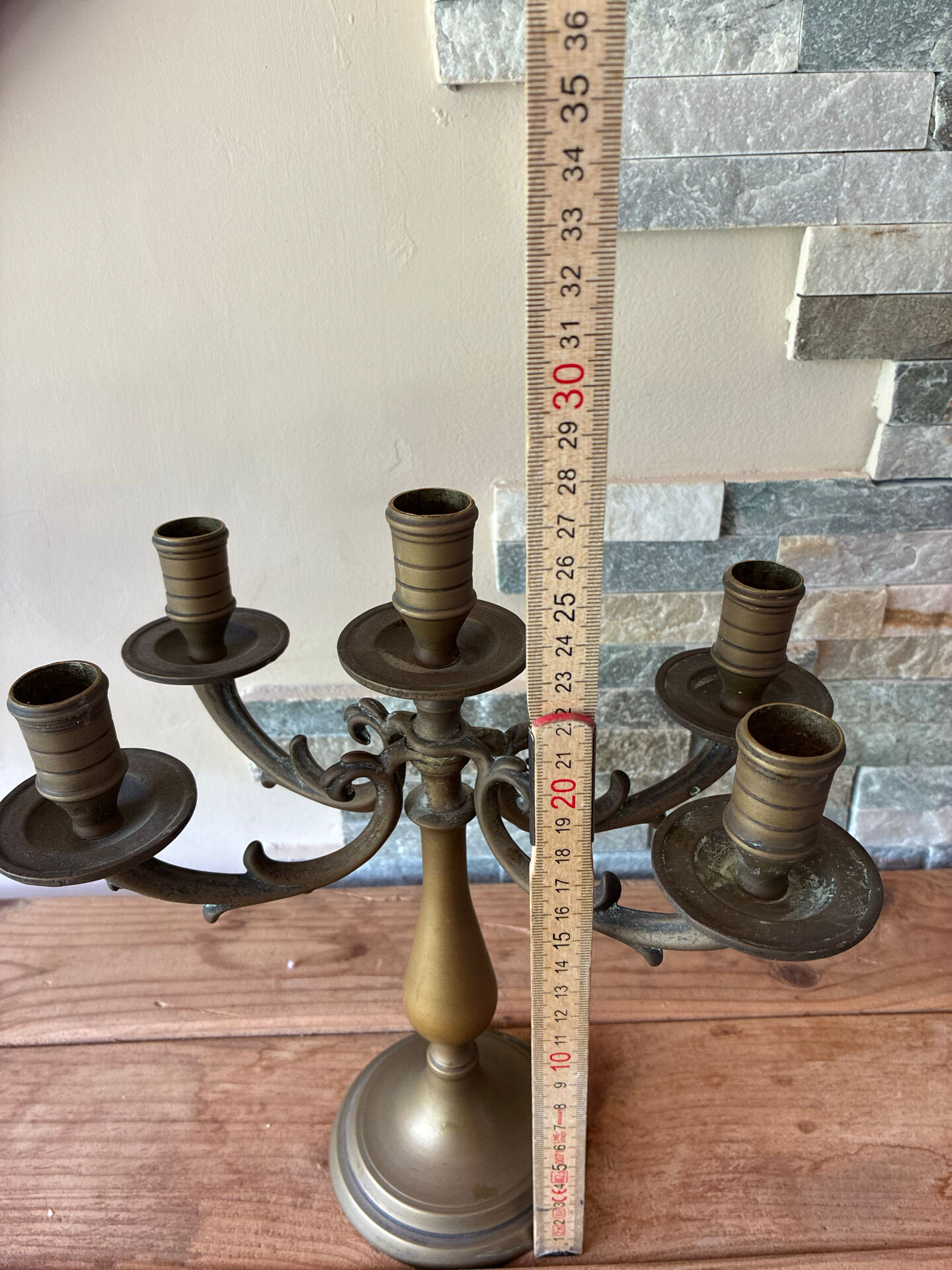 Pair of large 5-light candlesticks in patinated brass, classical style.