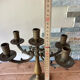 Pair of large 5-light candlesticks in patinated brass, classical style.