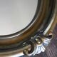 Golden Oval Mirror with Bow and Roses Decor
