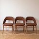 Set of 3 vintage 1960s chairs in wood and brown fabric.