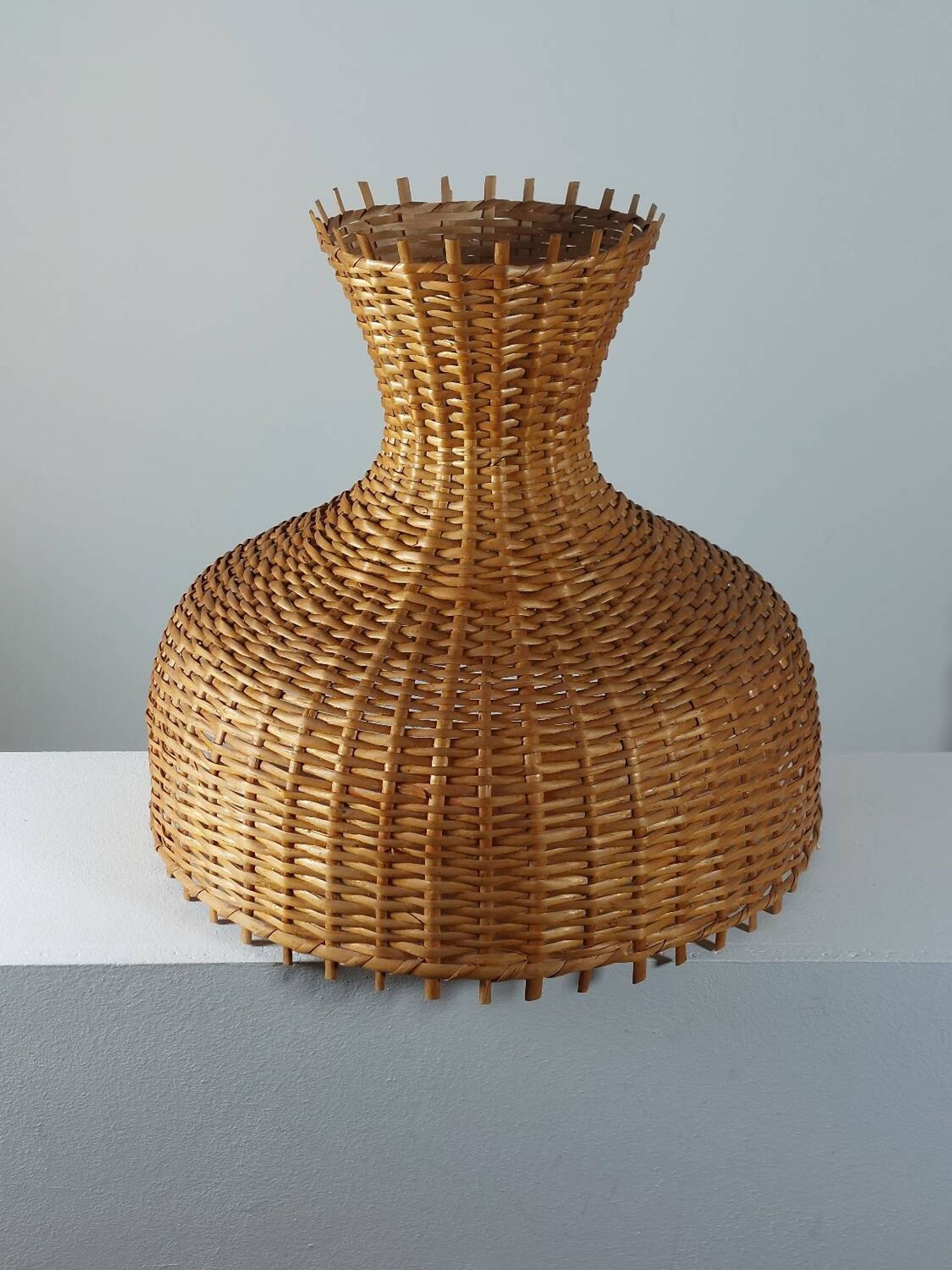 Vintage rattan lampshade from the 70s, mid-century style.