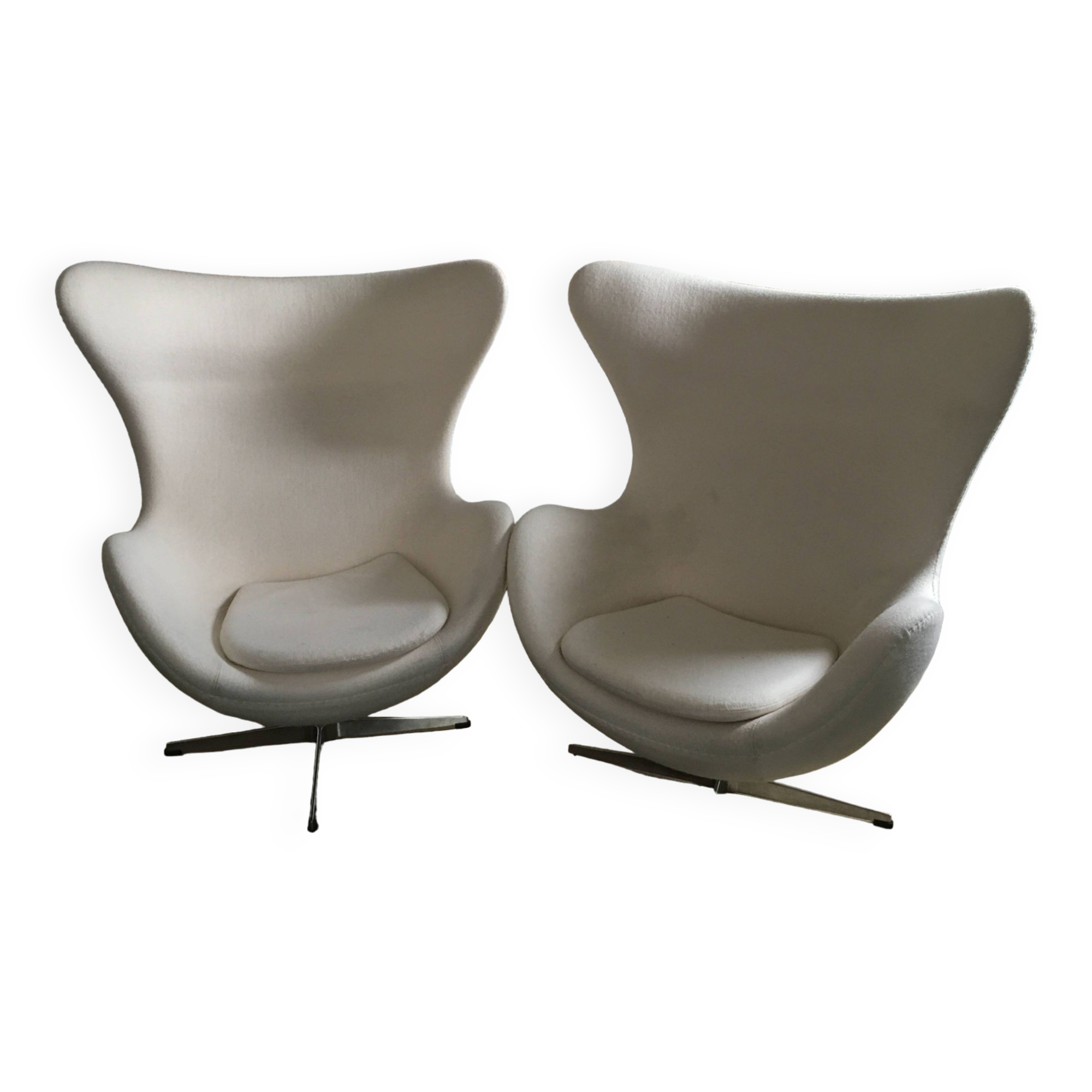 2 white felt egg chairs