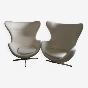 2 white felt egg chairs