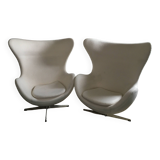 2 white felt egg chairs