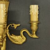 Pair of large Empire style wall lights, torch and swans - gilt bronze