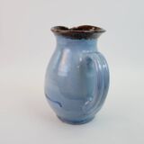 Large blue pitcher with abstract pattern