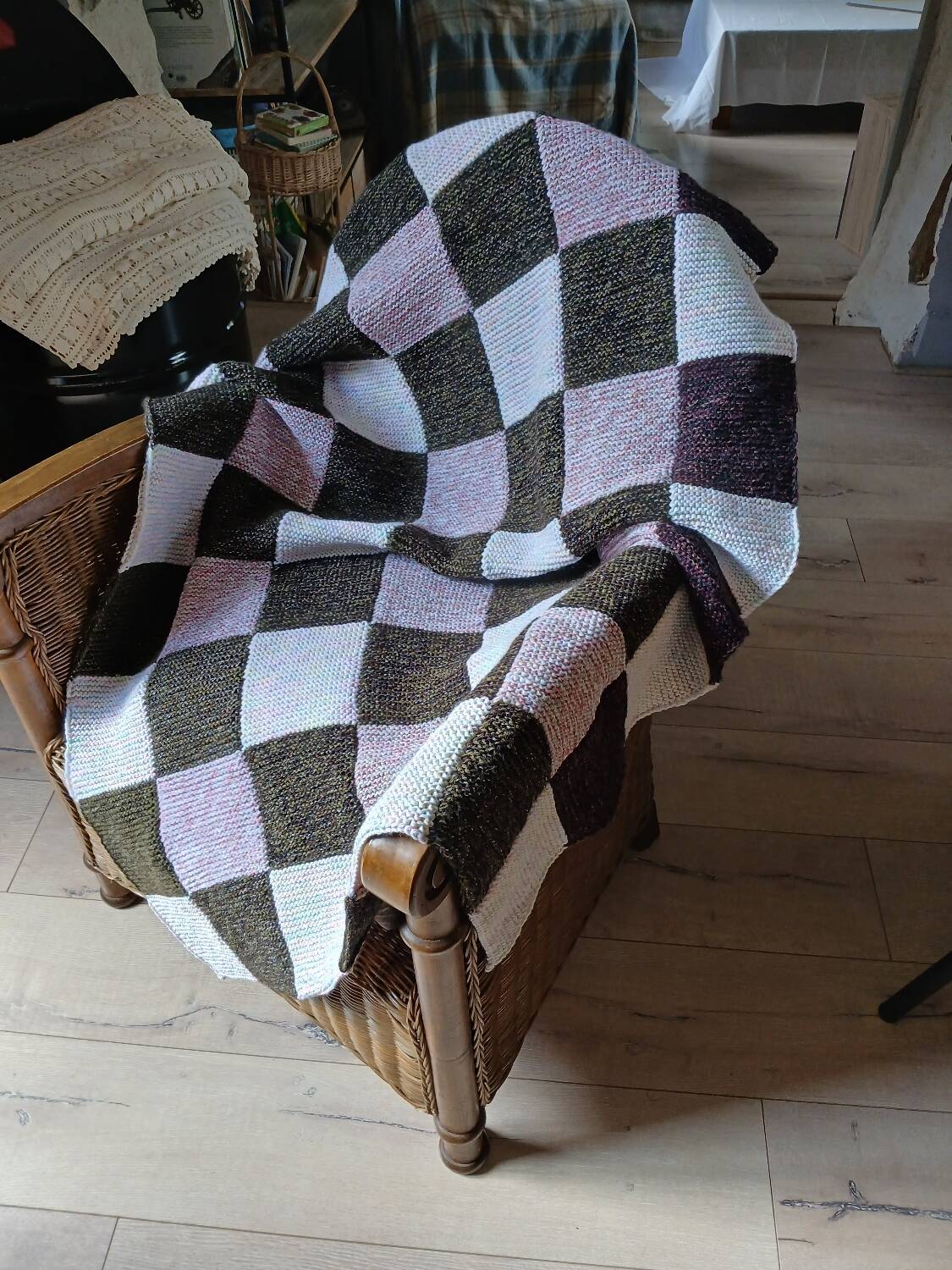 Hand-knitted patchwork plaid