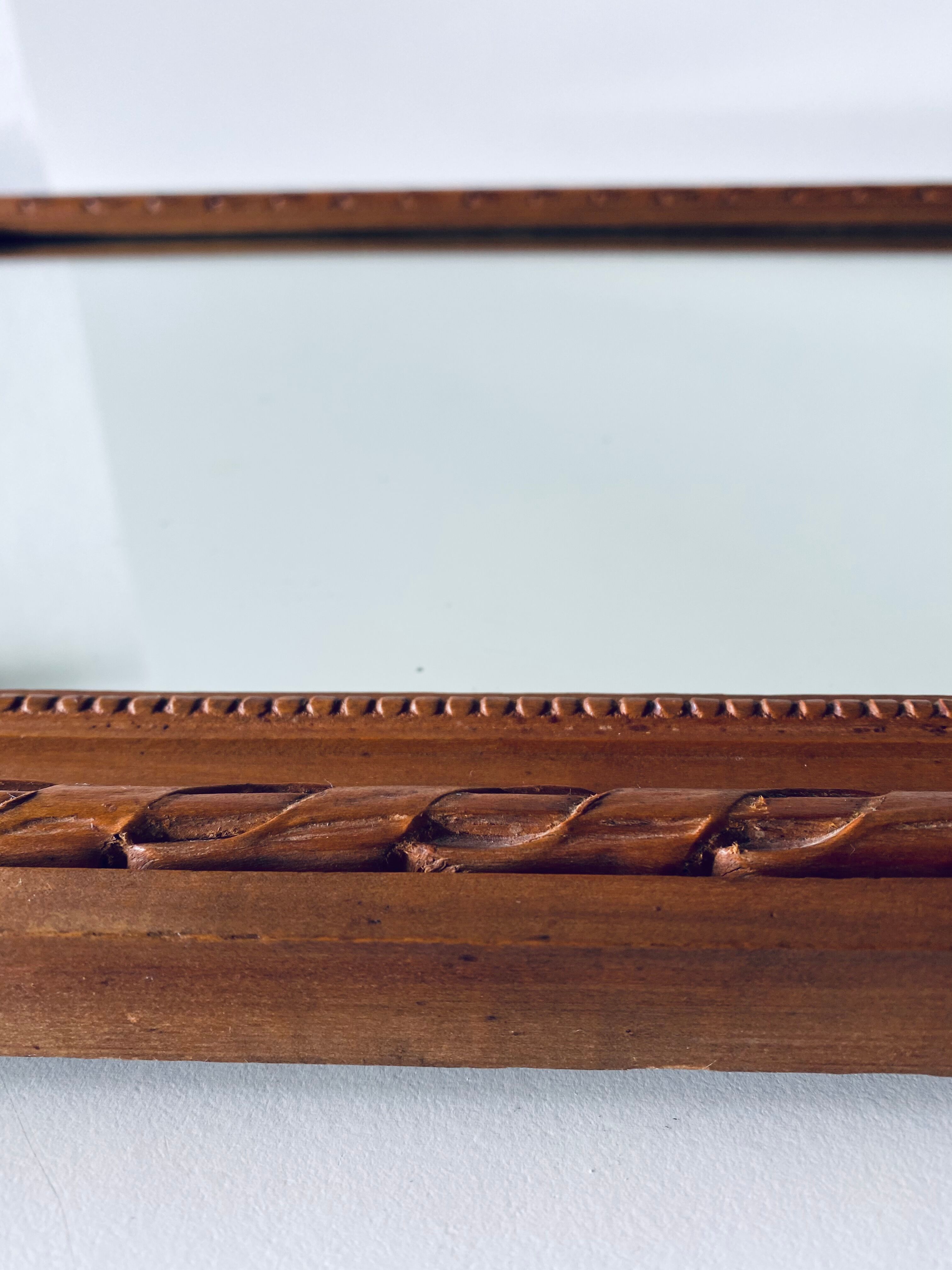 Antique mirror in carved wood and mercury 48x63cm