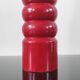 Giant vintage red lacquered wooden pepper mill