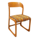 Vintage sled chair by Baumann in wood and wool fabric.