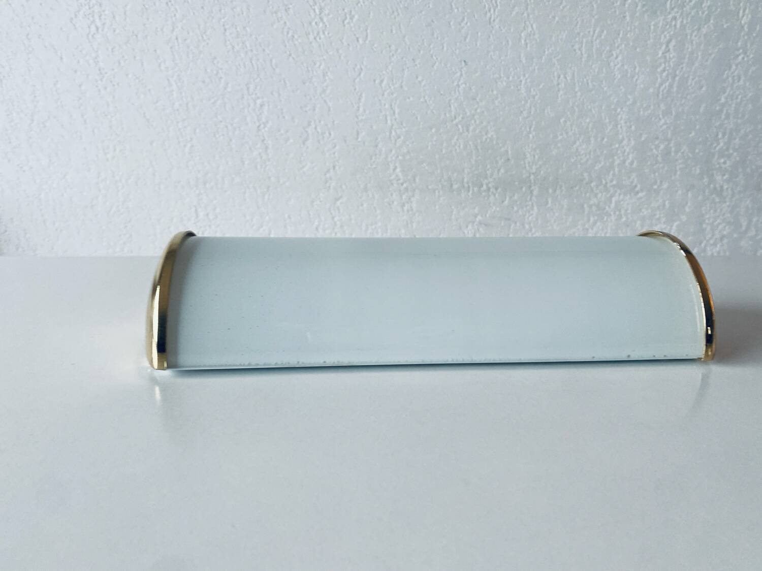 Brass and glass wall light
