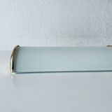 Brass and glass wall light