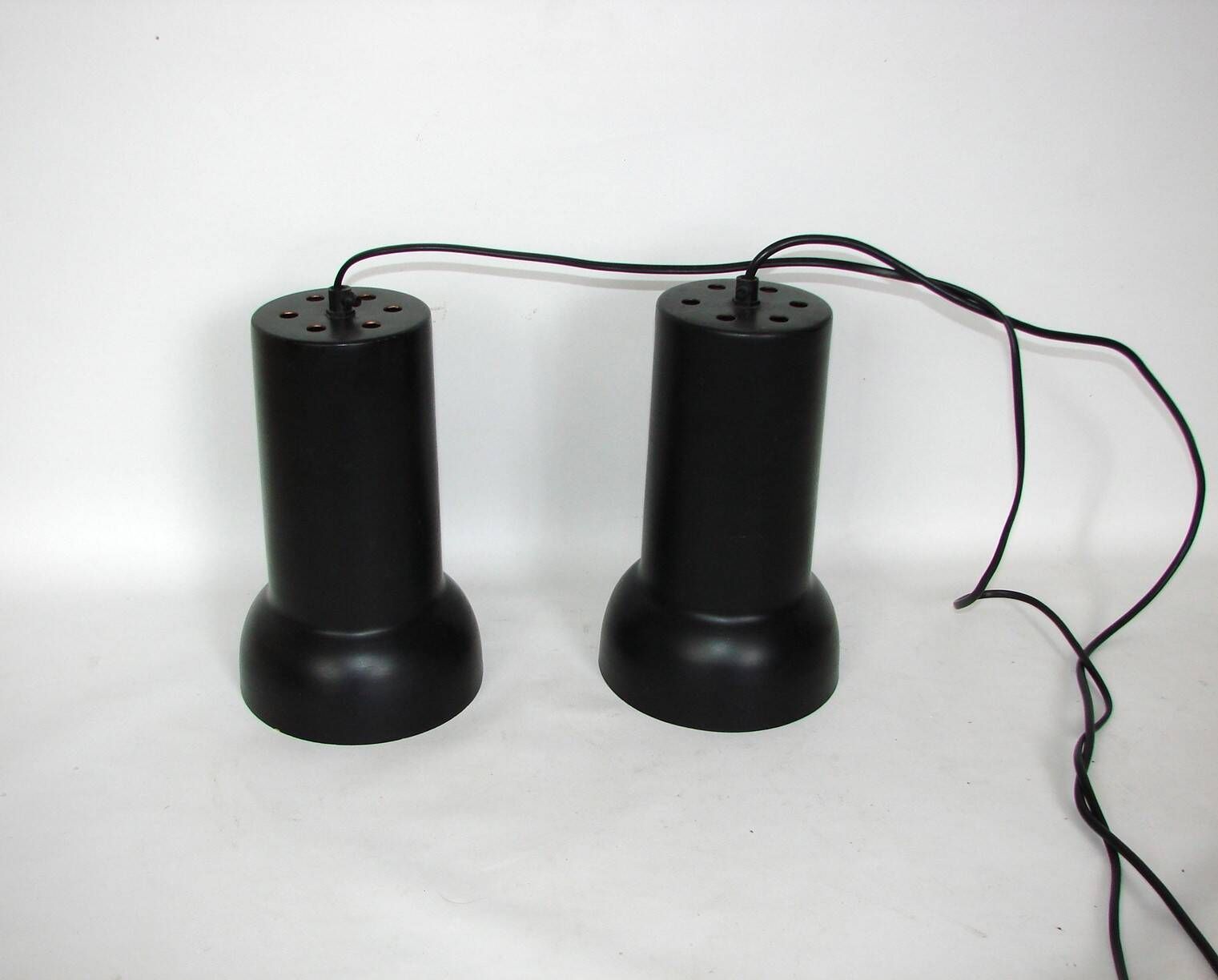 A pair of vintage pendant lights – black brass, modernist