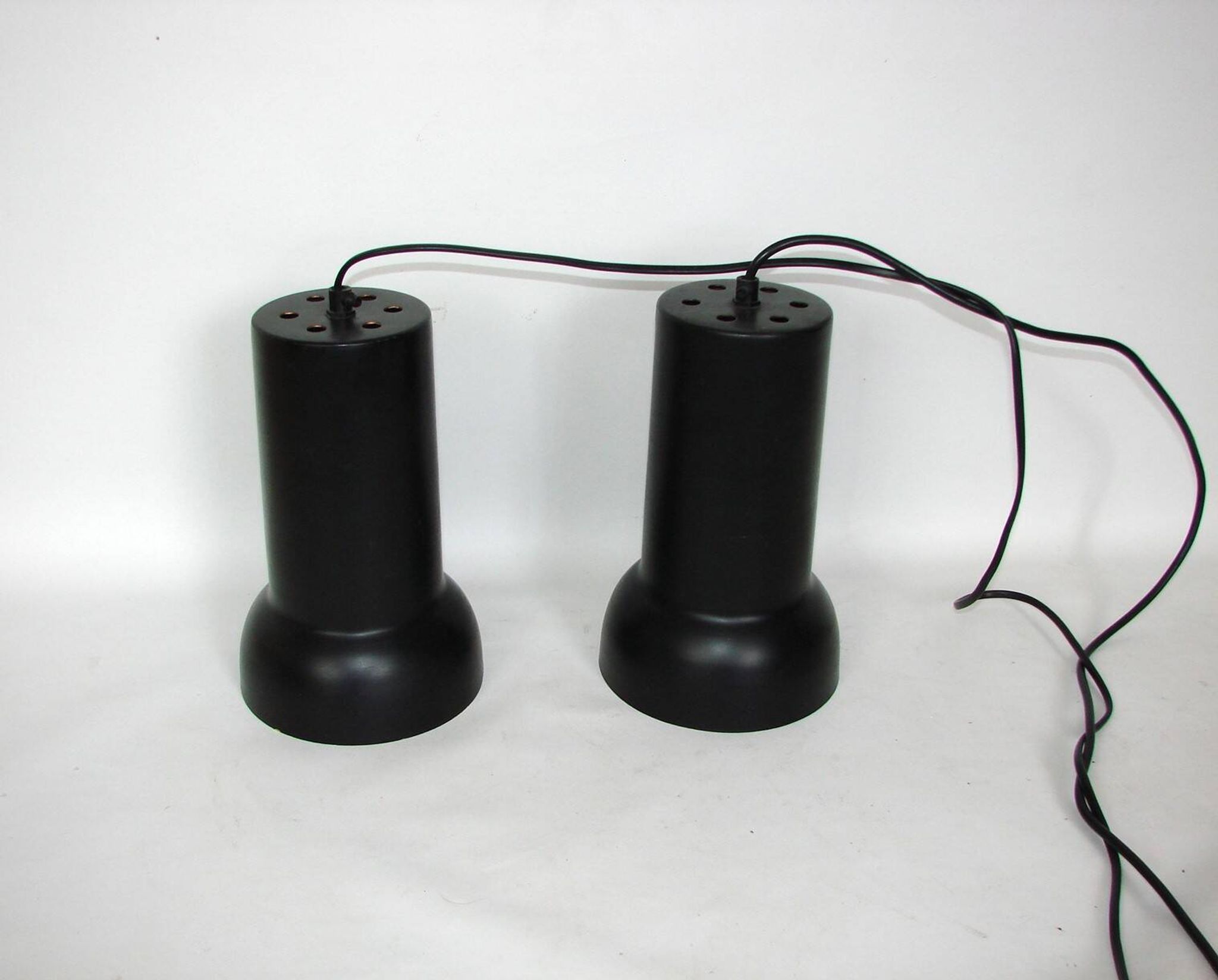 A pair of vintage pendant lights – black brass, modernist