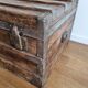 Large-scale marine style decorative wooden trunk with interior upholstery