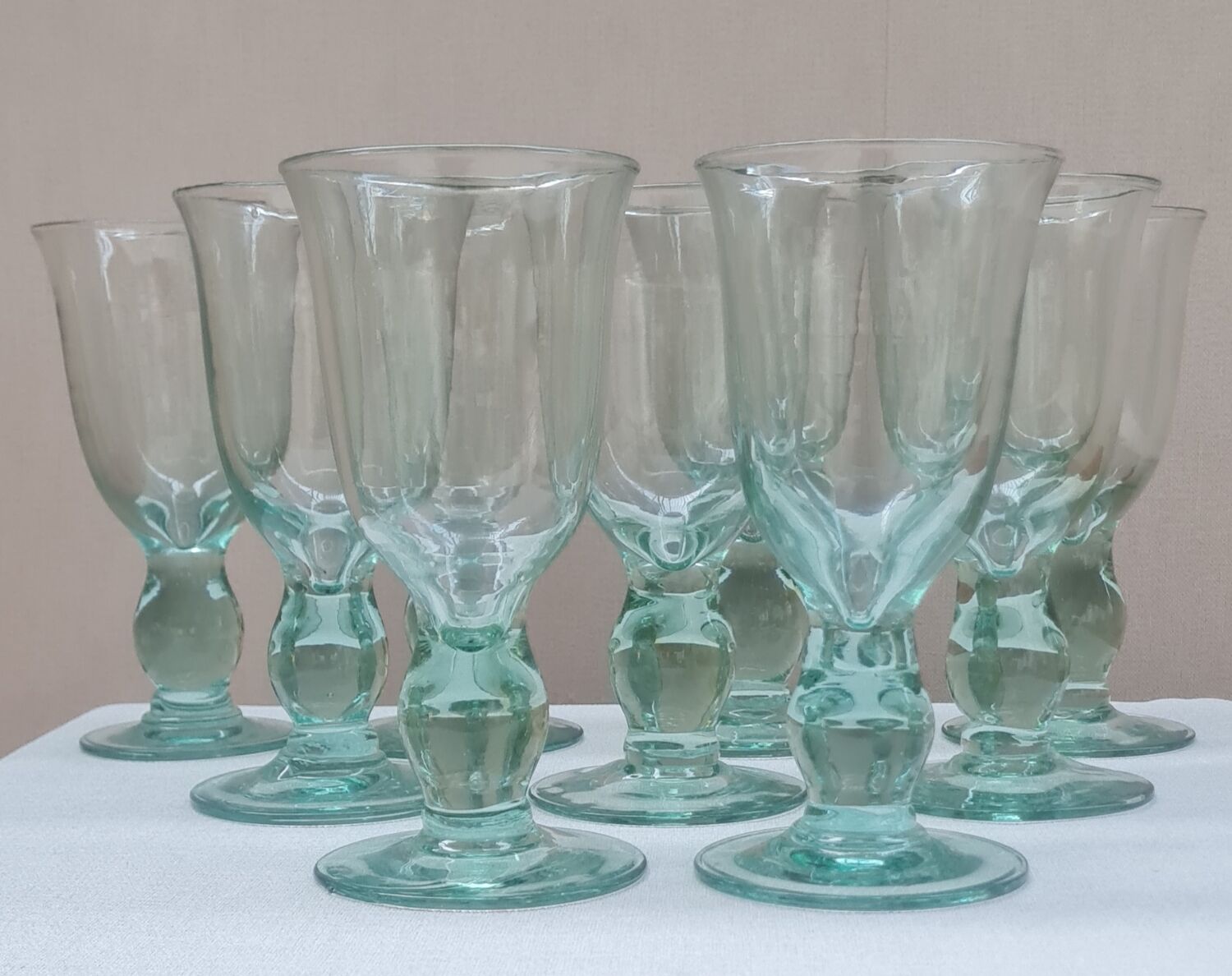 Service of 9 large blown glass stemmed glasses