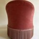 Pink-orange velvet tub chair