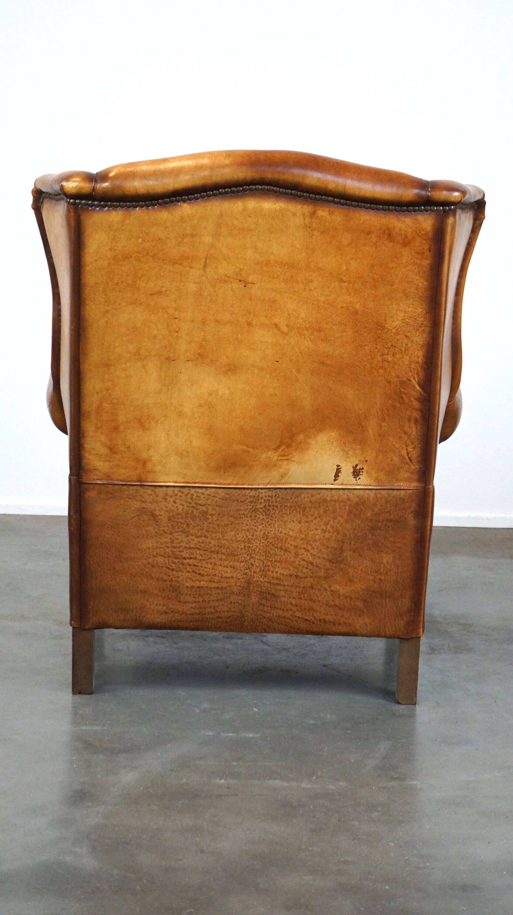 Beautiful and Comfortable Sheepskin Wingback Armchair with a Wonderful Patina