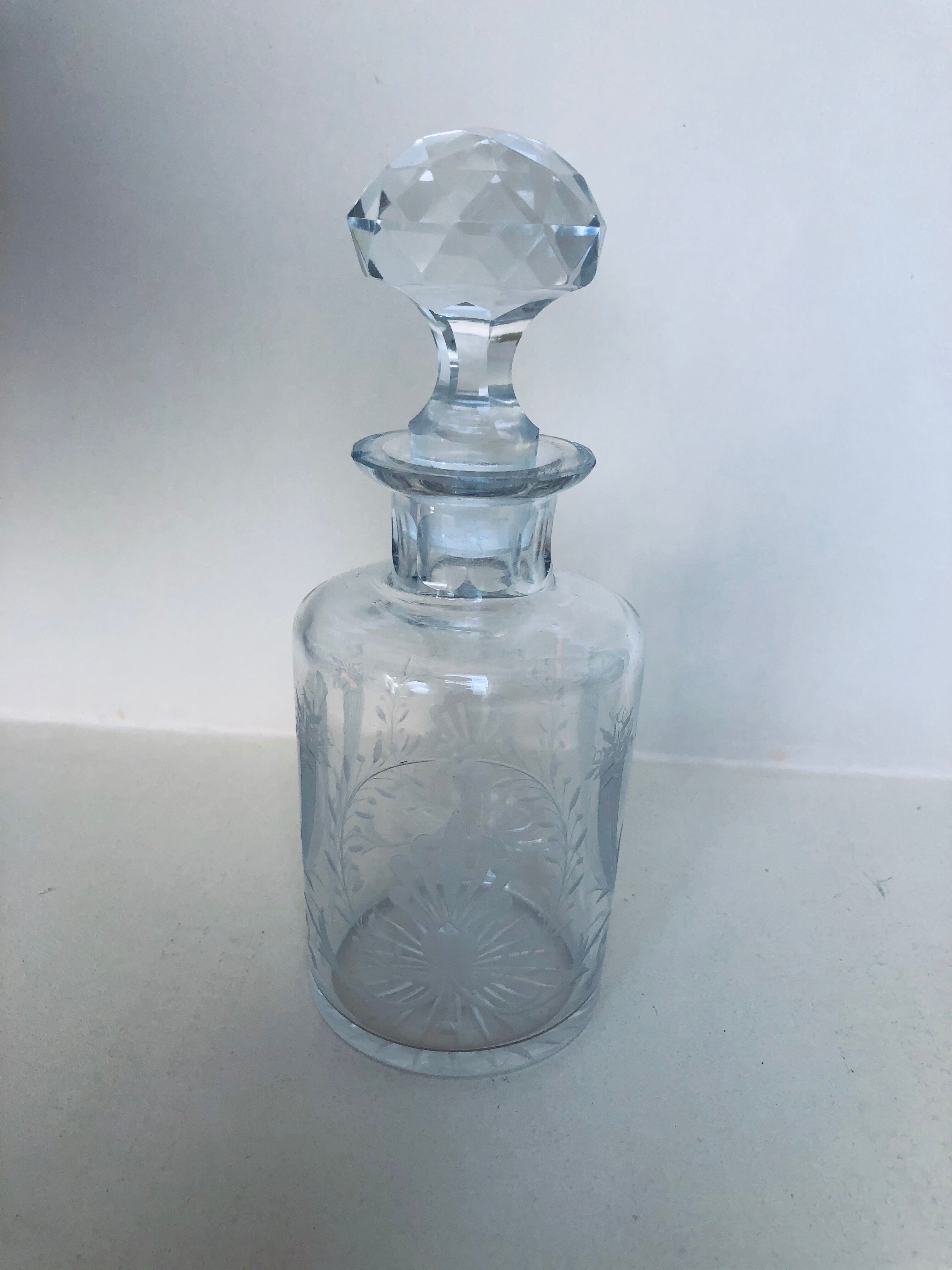 Old engraved crystal bottle