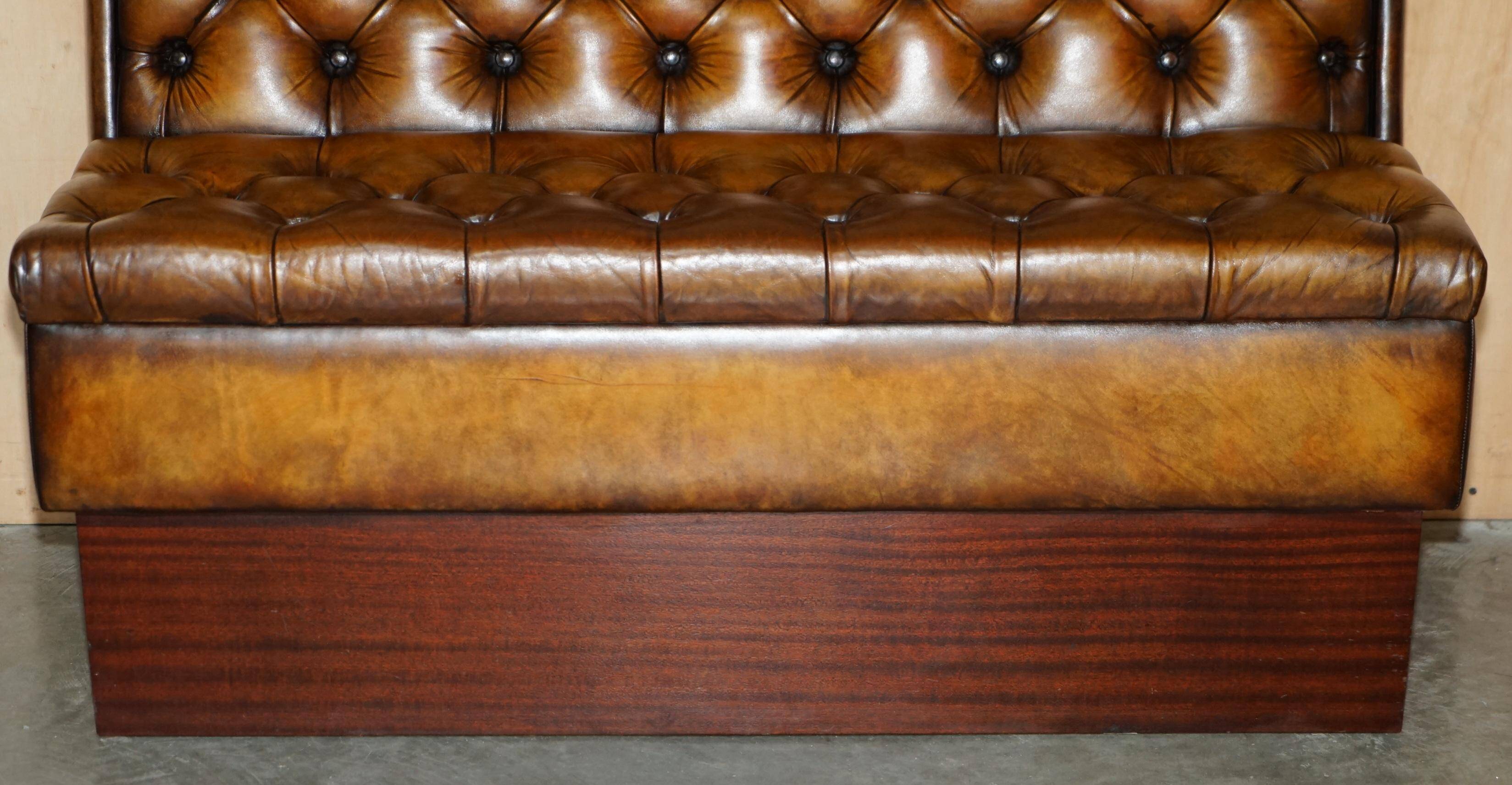 Pair of Victorian Chesterfield pub benches in leather.