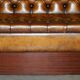 Pair of Victorian Chesterfield pub benches in leather.