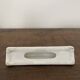 Vintage knife holders of 12, in white wave-shaped porcelain