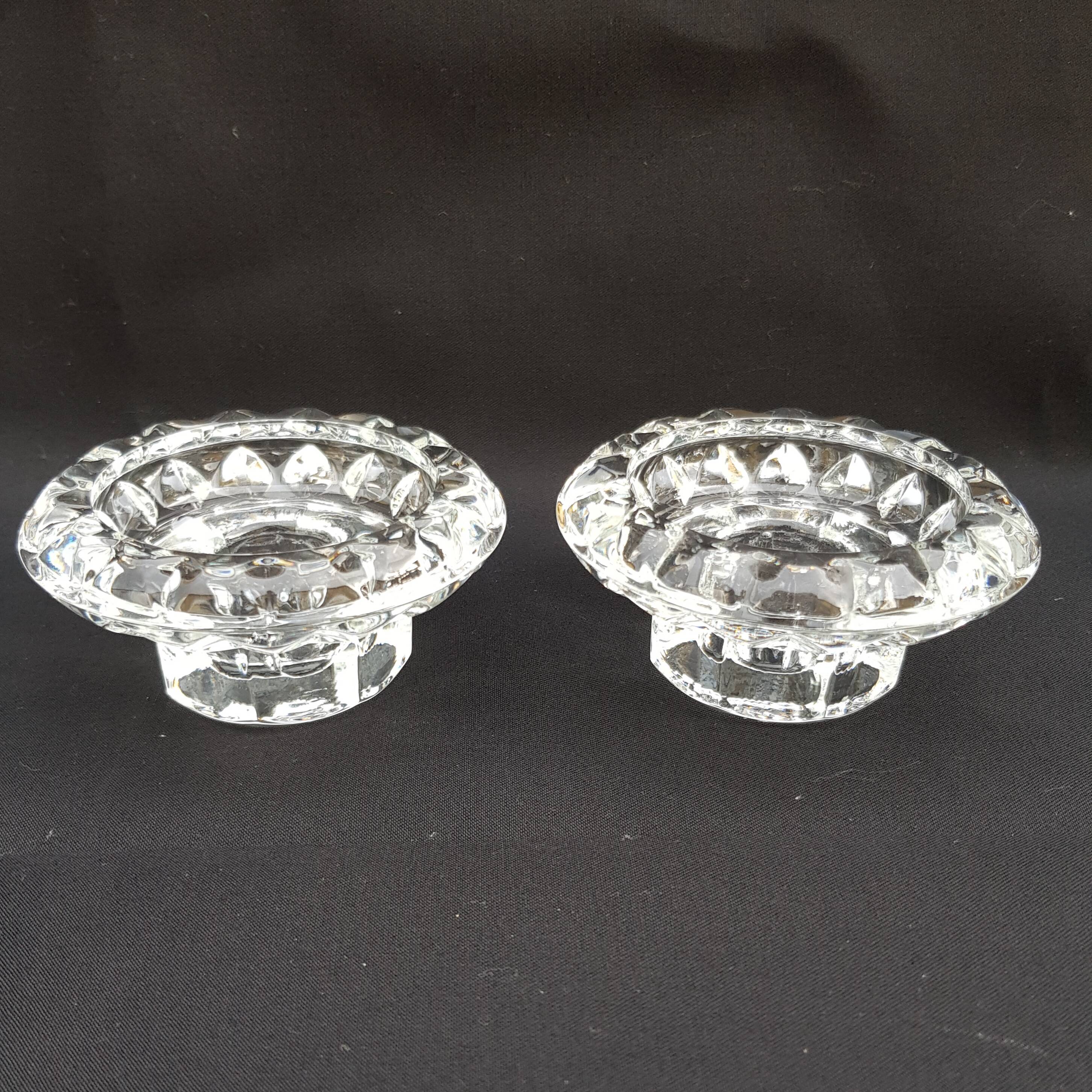 Duo of old glass candlesticks