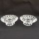 Duo of old glass candlesticks