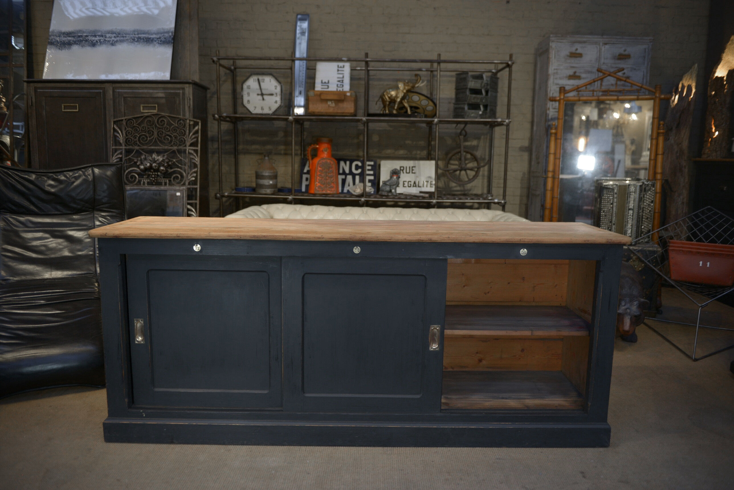 Low cabinet with sliding doors in fir 1930