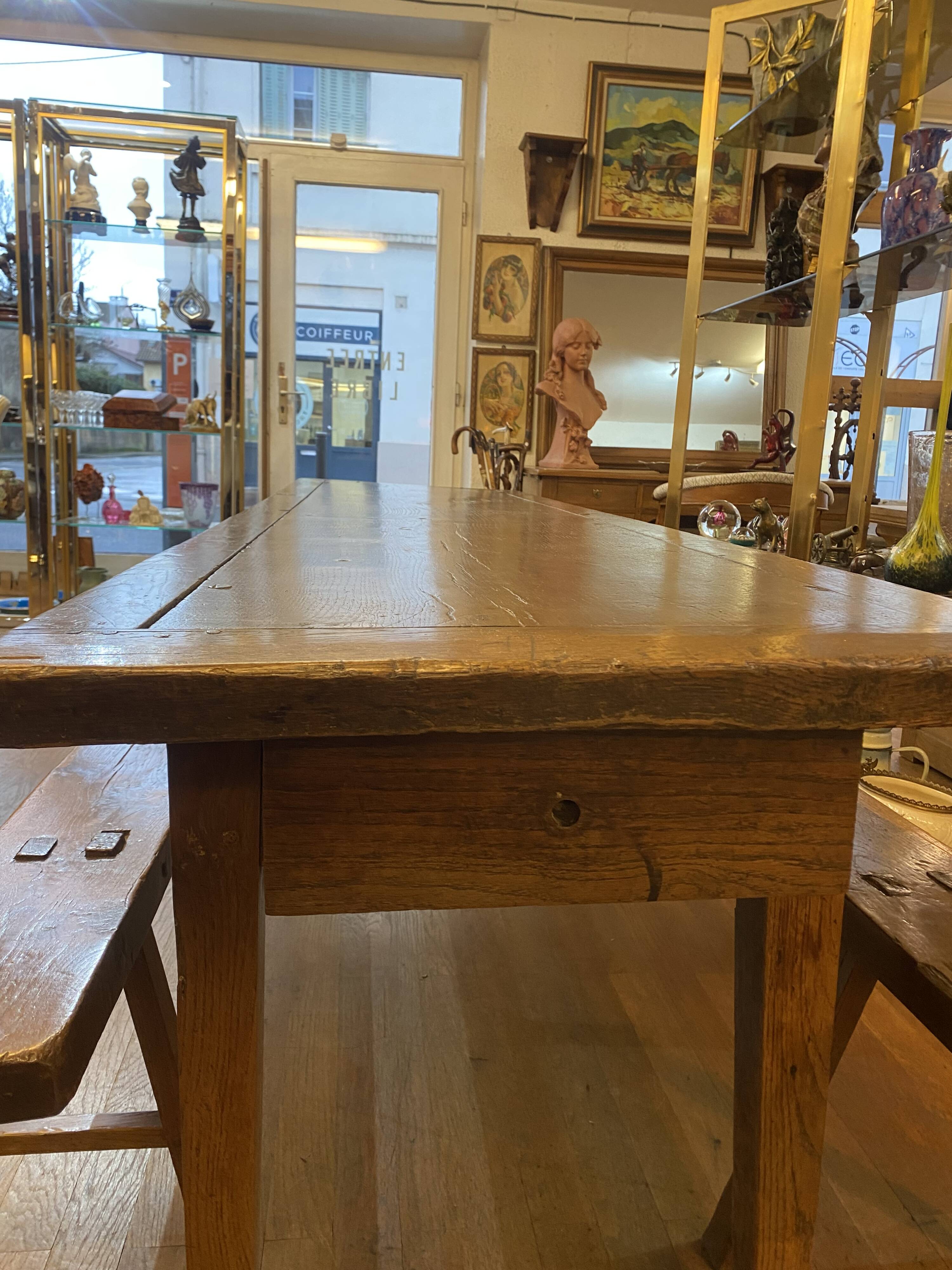 Farm table with its 2 benches.